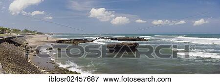Stock Photo - "Rocks in the surf, Echo Beach, surf beach Batubelig, Seminyak, Bali, Indonesia, Asia". Fotosearch