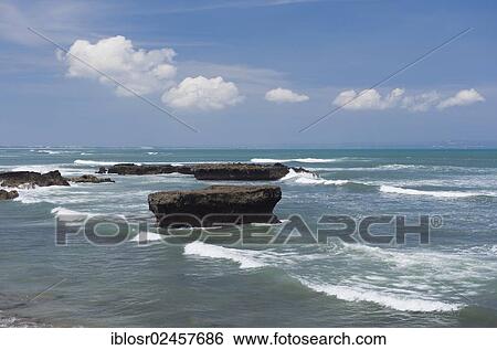 "Rocks in the surf, Echo Beach, surf beach Batubelig, Seminyak, Bali, Indonesia, Asia" View Large Photo Image Stock Photograph - "Rocks in the surf, Echo Beach, surf beach Batubelig, Seminyak, Bali, Indonesia, Asia". Fotosearch