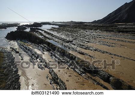 "Rocks on the beach, on the Atlantic coast, Praia da Amoreira beach, Aljezur, Faro District, Portugal, Europe" View Large Photo Image Stock Image - "Rocks on the beach, on the Atlantic coast, Praia da Amoreira beach, Aljezur, Faro District, Portugal, Europe". Fotosearch