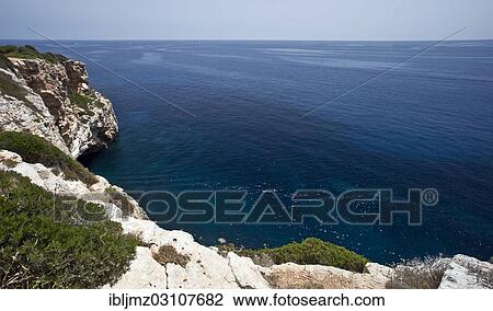 "Rocky coastline near Es Pontas, Santanyi, Mallorca, Majorca, Balearic Islands, Spain, Europe" View Large Photo Image Stock Image - "Rocky coastline near Es Pontas, Santanyi, Mallorca, Majorca, Balearic Islands, Spain, Europe". Fotosearch