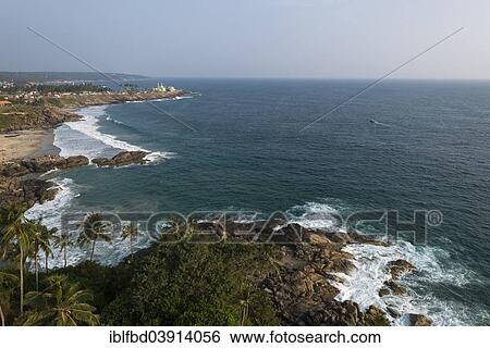 Stock Photograph - "Rocky coastline north of Kovalam, Thiruvananthapuram, Kerala, India, Asia". Fotosearch