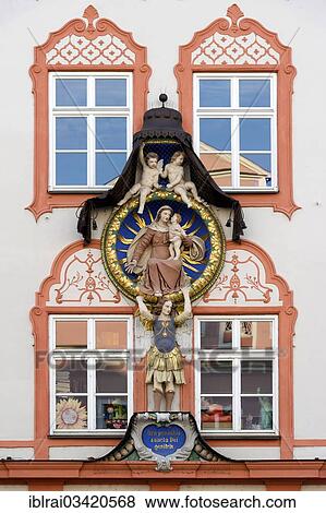 "Rococo plasterwork of a medallion, Virgin Mary with child, cherubs and the Archangel Gabriel, on a town house in the old town, Landshut, Lower Bavaria, Bavaria, Germany, Europe" View Large Photo Image Stock Photo - "Rococo plasterwork of a medallion, Virgin Mary with child, cherubs and the Archangel Gabriel, on a town house in the old town, Landshut, Lower Bavaria, Bavaria, Germany, Europe". Fotosearch