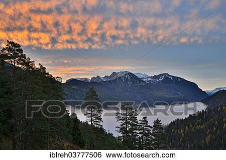 "Rofan Mountain Range at sunrise, from Brundlalm, Tyrol, Austria, Europe" View Large Photo Image Stock Photograph - "Rofan Mountain Range at sunrise, from Brundlalm, Tyrol, Austria, Europe". Fotosearch