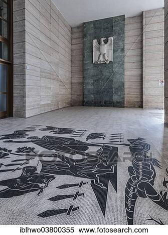 "Roma Ostiense railway station, built in 1938 for Hitler's visit to Rome, mosaics in the vestibule showing the superiority of ancient Rome, fascist symbols, Rome, Lazio, Italy, Europe" View Large Photo Image Stock Photography - "Roma Ostiense railway station, built in 1938 for Hitler's visit to Rome, mosaics in the vestibule showing the superiority of ancient Rome, fascist symbols, Rome, Lazio, Italy, Europe". Fotosearch