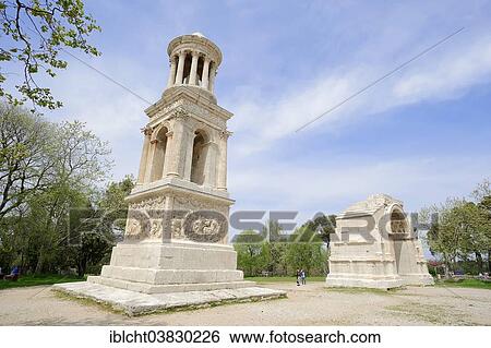 Stock Photograph - "Roman Mausoleum of the Julii and Triumphal Arch, Saint Remy-de-Provence, Bouches-du-Rhone, Provence-Alpes-Cote d'Azur, Southern France, Glanum, France, Europe". Fotosearch