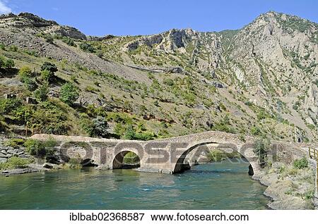 "Romanesque bridge across the Noguera Ribagorzana river, village of Sopeira, Pyrenees, Huesca province, Aragon, Spain, PublicGround, Europe" View Large Photo Image Stock Photo - "Romanesque bridge across the Noguera Ribagorzana river, village of Sopeira, Pyrenees, Huesca province, Aragon, Spain, PublicGround, Europe". Fotosearch