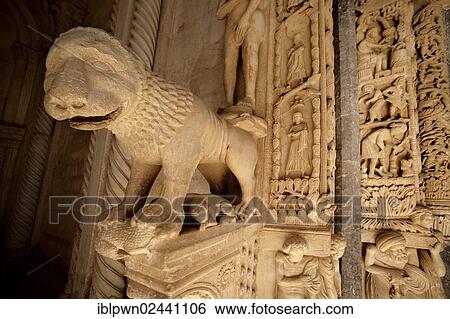Stock Photograph - "Romanesque doorway with sculpture of a lion by the Croatian architect Master Radovan, Saint Lawrence Cathedral, Trogir, Croatia, Europe". Fotosearch