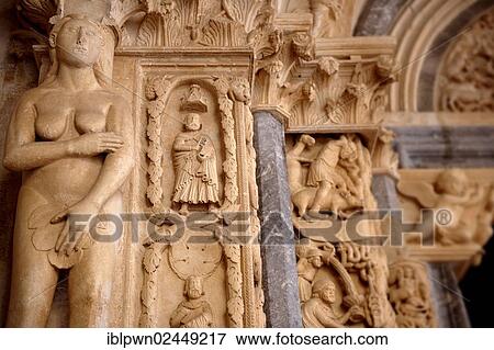 "Romanesque doorway with sculptures of Eve by the Croatian architect Master Radovan, Saint Lawrence Cathedral, Trogir, Croatia, Europe" View Large Photo Image Stock Photo - "Romanesque doorway with sculptures of Eve by the Croatian architect Master Radovan, Saint Lawrence Cathedral, Trogir, Croatia, Europe". Fotosearch