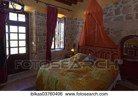 "Romantic hotel room with canopy and metal bed, Nikos Takis Fashion Hotel, Rhodes, Rhodes island, Dodecanese, Greece, Europe" View Large Photo Image Stock Photograph - "Romantic hotel room with canopy and metal bed, Nikos Takis Fashion Hotel, Rhodes, Rhodes island, Dodecanese, Greece, Europe". Fotosearch