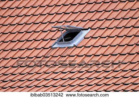 Stock Image - "Roof, skylight, roof tiles, North Rhine-Westphalia, Germany, Europe". Fotosearch