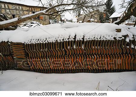 "Roof tiles stacked in the snow, Benzendorf, Middle Franconia, Bavaria, Germany, Europe" View Large Photo Image Stock Image - "Roof tiles stacked in the snow, Benzendorf, Middle Franconia, Bavaria, Germany, Europe". Fotosearch