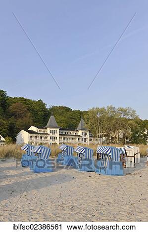 "Roofed beach chairs on the beach of the Baltic Sea resort town of Binz, with copy space, Ruegen, Mecklenburg-Western Pomerania, Germany, Europe" View Large Photo Image Stock Image - "Roofed beach chairs on the beach of the Baltic Sea resort town of Binz, with copy space, Ruegen, Mecklenburg-Western Pomerania, Germany, Europe". Fotosearch