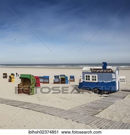 "Roofed wicker beach chair rental on the beach, Juist island, North Sea, Lower Saxony, Germany, Europe" View Large Photo Image Stock Image - "Roofed wicker beach chair rental on the beach, Juist island, North Sea, Lower Saxony, Germany, Europe". Fotosearch