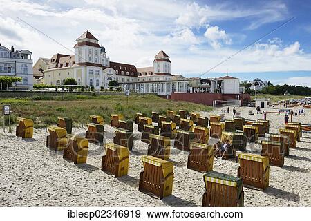 Stock Photo - "Roofed wicker beach chairs on the beach in front of the Kurhaus spa building, Binz, Mecklenburg-Western Pomerania, Germany, Europe". Fotosearch