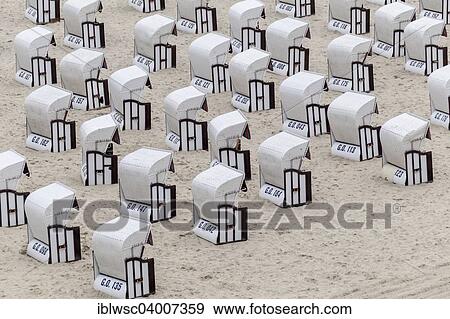 "Roofed wicker beach chairs on the beach, Baltic seaside resort Sellin, Rugen, Mecklenburg-Western Pomerania, Germany, Europe" View Large Photo Image Stock Photo - "Roofed wicker beach chairs on the beach, Baltic seaside resort Sellin, Rugen, Mecklenburg-Western Pomerania, Germany, Europe". Fotosearch
