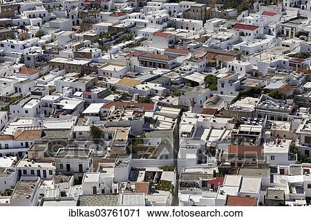 "Roofs of the town of Lindos, Rhodes, Dodecanese, Greece island" View Large Photo Image Stock Image - "Roofs of the town of Lindos, Rhodes, Dodecanese, Greece island". Fotosearch