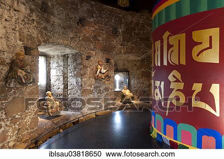 "Room with a Tibetan prayer wheel and Buddha statues, Messner Mountain Museum Firmian from Reinhold Messner, Schloss Sigmundskron Castle, castle ruins near Bolzano, Alto Adige, Trentino-Alto Adige, Italy, Europe" View Large Photo Image Stock Image - "Room with a Tibetan prayer wheel and Buddha statues, Messner Mountain Museum Firmian from Reinhold Messner, Schloss Sigmundskron Castle, castle ruins near Bolzano, Alto Adige, Trentino-Alto Adige, Italy, Europe". Fotosearch