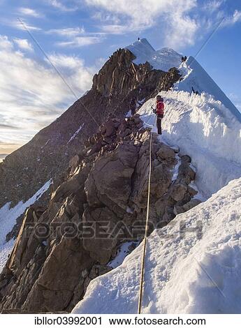 "Roped alpinist on the mountain ridge, Huayna Potosi, Cordillera Real, Bolivia, South America" View Large Photo Image Stock Image - "Roped alpinist on the mountain ridge, Huayna Potosi, Cordillera Real, Bolivia, South America". Fotosearch