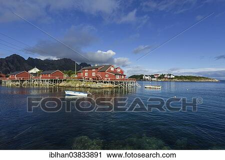 "Rorbuer fishermen's cabins with a small motor boat, Henningsvaer, Lofoten, Nordland, Norway, Europe" View Large Photo Image Stock Image - "Rorbuer fishermen's cabins with a small motor boat, Henningsvaer, Lofoten, Nordland, Norway, Europe". Fotosearch