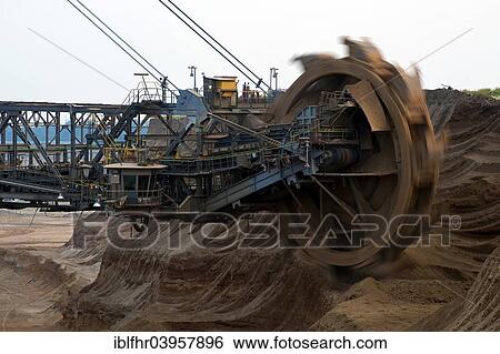 Stock Photograph - "Rotating bucket wheel of an overburden excavator, Grevenbroich, North Rhine-Westphalia, Germany, Europe". Fotosearch