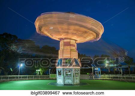 "Rotating swing ride, Ocean Park, Hong Kong Island, Hong Kong, China, Asia" View Large Photo Image Stock Photo - "Rotating swing ride, Ocean Park, Hong Kong Island, Hong Kong, China, Asia". Fotosearch