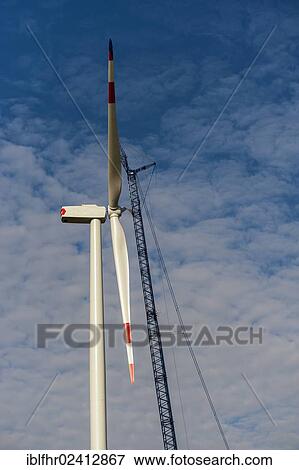 Rotor blades of a wind turbine in front of the generator nacelle, Grevenbroich, North Rhine-Westphalia, Germany, Europe View Large Photo Image Stock Photo - Rotor blades of a wind turbine in front of the generator nacelle, Grevenbroich, North Rhine-Westphalia, Germany, Europe. Fotosearch