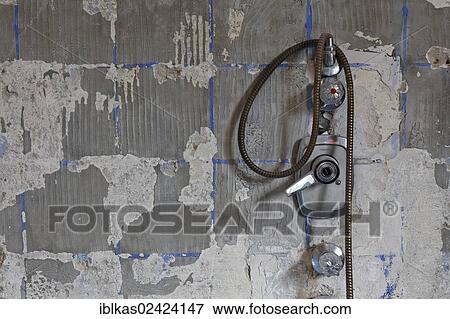 Rotted bathtub fittings, removed tiles, old bathroom, old bathtub, bathroom renovation View Large Photo Image Stock Photo - Rotted bathtub fittings, removed tiles, old bathroom, old bathtub, bathroom renovation. Fotosearch