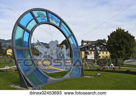 "Roundabout with cyclists riding electric bicycles, Obertrum, Salzburg Lake District, Salzburg, Austria, Europe" View Large Photo Image Stock Image - "Roundabout with cyclists riding electric bicycles, Obertrum, Salzburg Lake District, Salzburg, Austria, Europe". Fotosearch