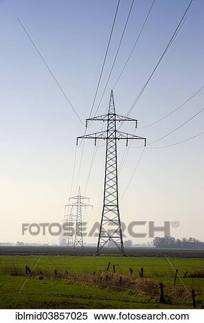 Stock Photography - "Route of a 110 kV transmission line, power line, near Heide, Schleswig-Holstein, Germany, Europe". Fotosearch