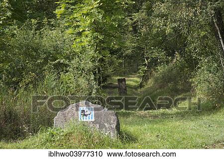"Route of the Buchenwaldbahn tracks, today memorial trail to the Buchenwald concentration camp, with symbol stones, behind historic milestone 5 k, Weimar, Thuringia, Germany, Europe" View Large Photo Image Stock Image - "Route of the Buchenwaldbahn tracks, today memorial trail to the Buchenwald concentration camp, with symbol stones, behind historic milestone 5 k, Weimar, Thuringia, Germany, Europe". Fotosearch