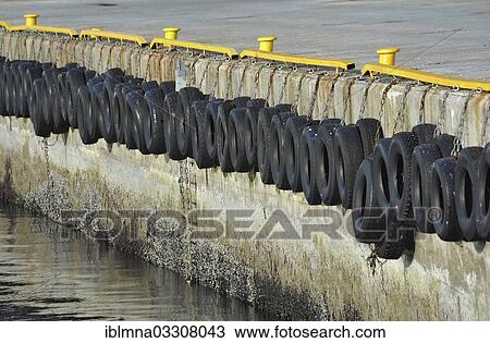 "Row of car tyres in the harbour of Honningsvag, Honningsvag, Mageroya, Finnmarken, Norway, Europe" View Large Photo Image Stock Image - "Row of car tyres in the harbour of Honningsvag, Honningsvag, Mageroya, Finnmarken, Norway, Europe". Fotosearch