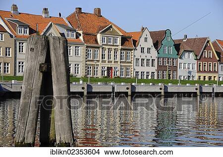 "Row of houses along the harbour, Glueckstadt, Schleswig-Holstein, Germany, Europe" View Large Photo Image Picture - "Row of houses along the harbour, Glueckstadt, Schleswig-Holstein, Germany, Europe". Fotosearch