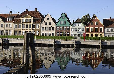 "Row of houses along the harbour, Glueckstadt, Schleswig-Holstein, Germany, Europe" View Large Photo Image Stock Photography - "Row of houses along the harbour, Glueckstadt, Schleswig-Holstein, Germany, Europe". Fotosearch