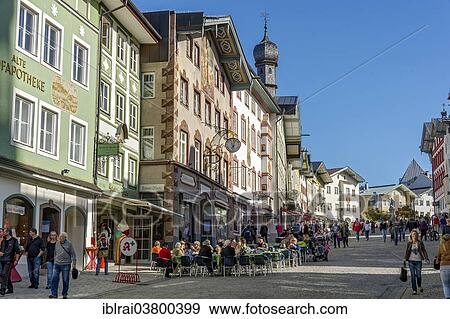 "Row of houses and street cafes at the Marktstrasse street, Bad Tolz, Upper Bavaria, Bavaria, Germany, Europe" View Large Photo Image Stock Photo - "Row of houses and street cafes at the Marktstrasse street, Bad Tolz, Upper Bavaria, Bavaria, Germany, Europe". Fotosearch