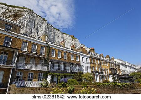 "Row of houses at the port at the foot of the White Cliffs, Dover, South East England, administrative county of Kent, England, United Kingdom, Europe" View Large Photo Image Stock Image - "Row of houses at the port at the foot of the White Cliffs, Dover, South East England, administrative county of Kent, England, United Kingdom, Europe". Fotosearch