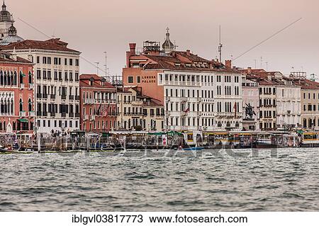 Stock Image - "Row of houses at the Riva degli Schiavoni, from the lagoon, Venice, Italy, Europe". Fotosearch