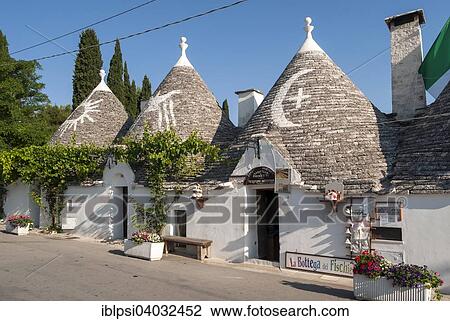 "Row of Trullo houses in Monte Pertica Street, Trulli Distrikt, Alberobello, Apulia, Italy, Europe" View Large Photo Image Stock Image - "Row of Trullo houses in Monte Pertica Street, Trulli Distrikt, Alberobello, Apulia, Italy, Europe". Fotosearch