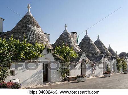 "Row of Trullo houses in Monte Pertica Street, Trulli Distrikt, Alberobello, Apulia, Italy, Europe" View Large Photo Image Stock Image - "Row of Trullo houses in Monte Pertica Street, Trulli Distrikt, Alberobello, Apulia, Italy, Europe". Fotosearch