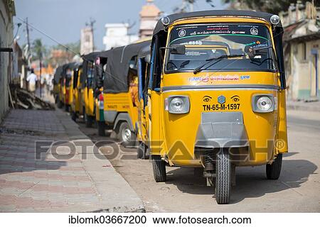"Row of yellow rickshaw taxis, Rameswaram, Pamban Island, Tamil Nadu, India, Asia" View Large Photo Image Stock Image - "Row of yellow rickshaw taxis, Rameswaram, Pamban Island, Tamil Nadu, India, Asia". Fotosearch