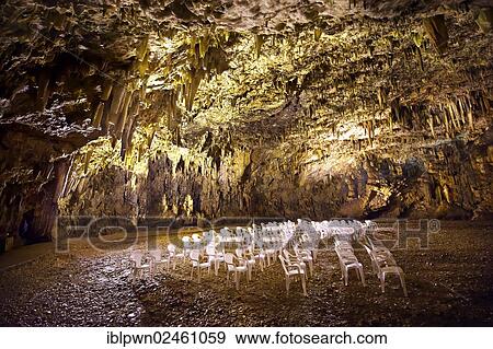 Stock Photo - "Rows of empty chairs in the Drogarati Cave, Kefalonia, Ionian Islands, Greece, Europe". Fotosearch