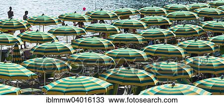 Stock Image - "Rows of parasols on the beach, Sestri Levante, Liguria, Italy, Europe". Fotosearch