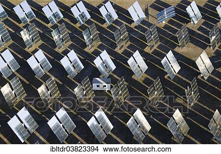 "Rows of solar panels, so-called heliostats, generating energy at a solar energy field in the Tabernas Desert, Almeria province, Andalucia, Spain, Europe" View Large Photo Image Picture - "Rows of solar panels, so-called heliostats, generating energy at a solar energy field in the Tabernas Desert, Almeria province, Andalucia, Spain, Europe". Fotosearch