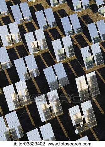 "Rows of solar panels, so-called heliostats, generating energy at a solar energy field in the Tabernas Desert, Almeria province, Andalucia, Spain, Europe" View Large Photo Image Stock Image - "Rows of solar panels, so-called heliostats, generating energy at a solar energy field in the Tabernas Desert, Almeria province, Andalucia, Spain, Europe". Fotosearch