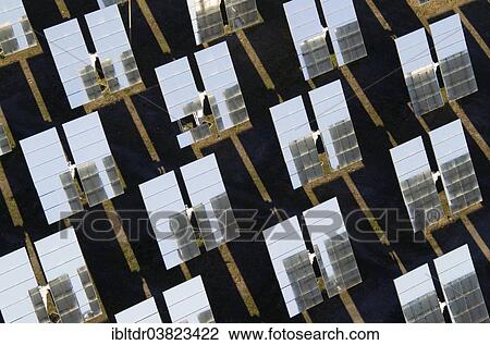 "Rows of solar panels, so-called heliostats, generating energy at a solar energy field in the Tabernas Desert, Almeria province, Andalucia, Spain, Europe" View Large Photo Image Stock Image - "Rows of solar panels, so-called heliostats, generating energy at a solar energy field in the Tabernas Desert, Almeria province, Andalucia, Spain, Europe". Fotosearch