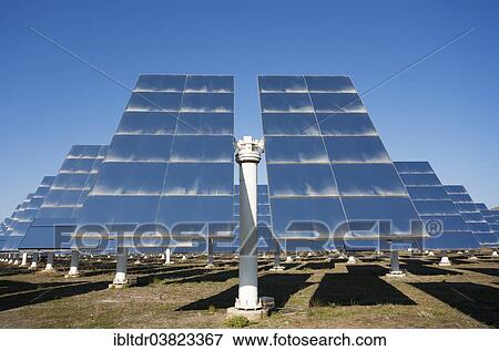 "Rows of solar panels, so-called heliostats, generating energy at a solar energy field in the Tabernas Desert, Almeria province, Andalucia, Spain, Europe" View Large Photo Image Stock Photo - "Rows of solar panels, so-called heliostats, generating energy at a solar energy field in the Tabernas Desert, Almeria province, Andalucia, Spain, Europe". Fotosearch