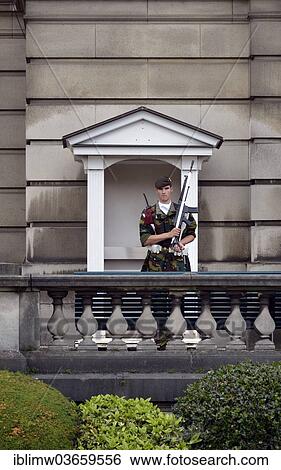 "Royal soldier, guard patrolling in front of a guard house, Royal Palace, Palais Royal, Brussels, Brussels Region, Belgium, Europe" View Large Photo Image Stock Photograph - "Royal soldier, guard patrolling in front of a guard house, Royal Palace, Palais Royal, Brussels, Brussels Region, Belgium, Europe". Fotosearch