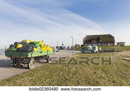 "Rubbish bags are transported to the mainland, small island of Langeness, North Frisia, Schleswig-Holstein, northern Germany, Germany, Europe" View Large Photo Image Stock Image - "Rubbish bags are transported to the mainland, small island of Langeness, North Frisia, Schleswig-Holstein, northern Germany, Germany, Europe". Fotosearch