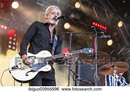 Stock Photograph - "Ruben Block, singer and guitarist of the Belgian rock band Triggerfinger, performing live at Heitere Open Air, Zofingen, Canton of Aargau, Switzerland, Europe". Fotosearch