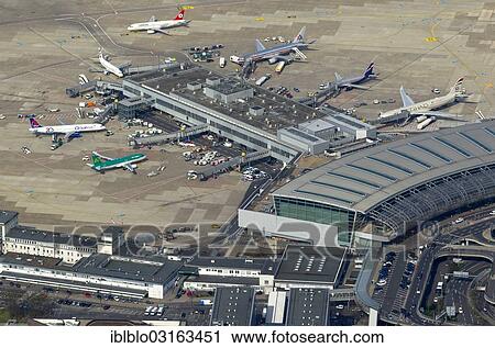 "Ruhr Runway, apron, jet bridges, Terminal C, Duesseldorf Airport, aerial view, Dusseldorf, Rhineland, North Rhine-Westphalia, Germany, Europe" View Large Photo Image Stock Image - "Ruhr Runway, apron, jet bridges, Terminal C, Duesseldorf Airport, aerial view, Dusseldorf, Rhineland, North Rhine-Westphalia, Germany, Europe". Fotosearch
