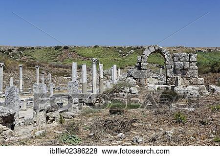 "Ruins and columns along colonnaded main street in the excavation site in the ancient city of Perge, Aksu, Turkish Riviera, Antalya, Turkey, Asia" View Large Photo Image Stock Photo - "Ruins and columns along colonnaded main street in the excavation site in the ancient city of Perge, Aksu, Turkish Riviera, Antalya, Turkey, Asia". Fotosearch